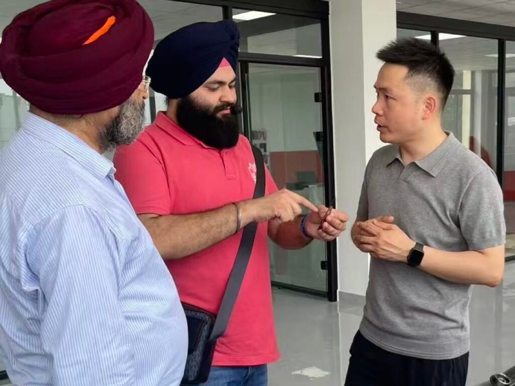 Kevin Chou discussing samples with customers