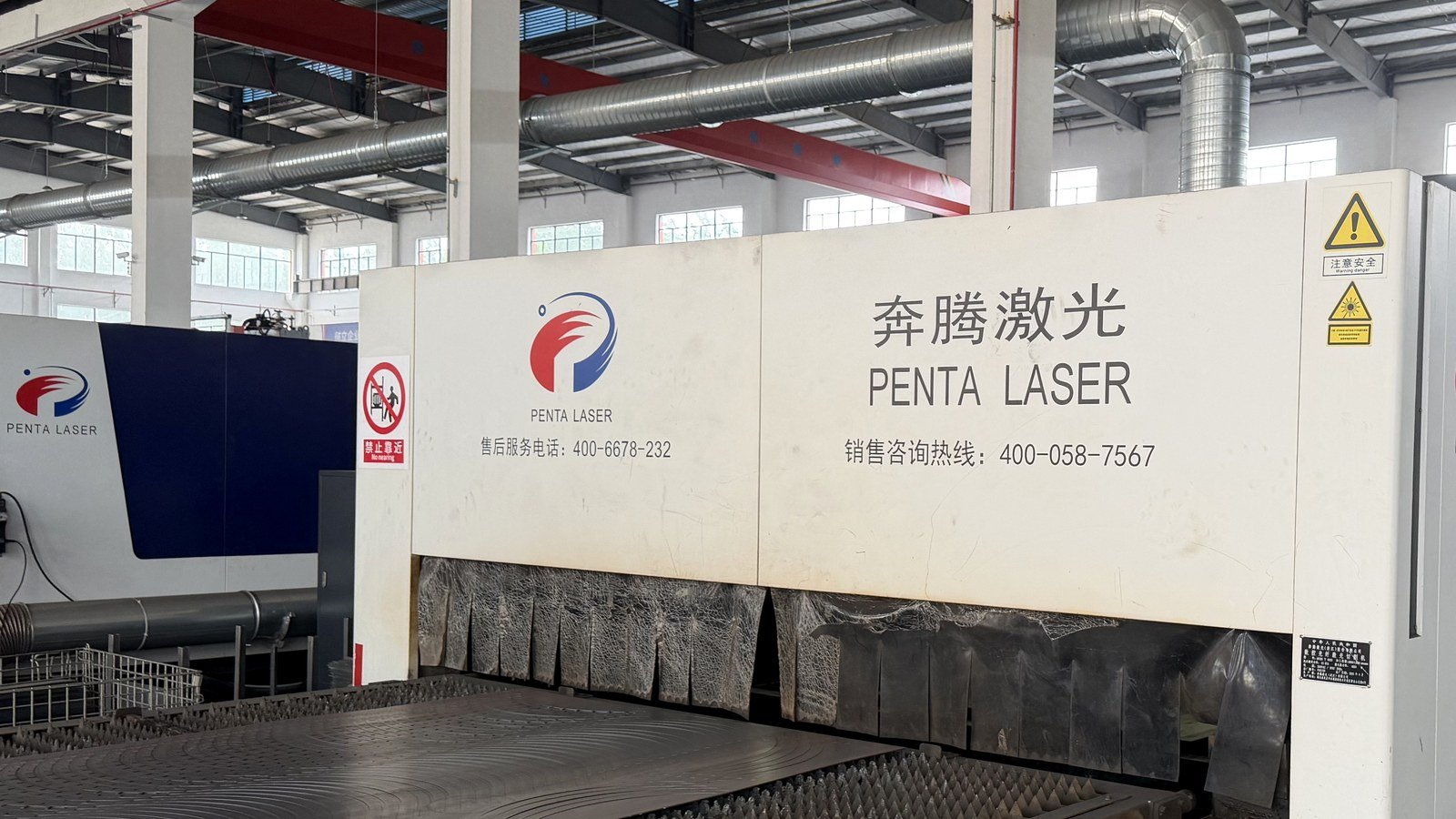 Precision laser cutting equipment for combine harvester parts